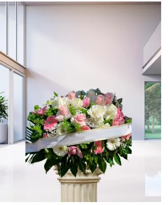 Cuscino funebre di rose bianche e rosa con verde ornamentale