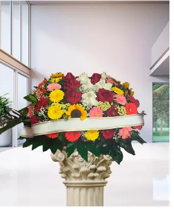 Cuscino funebre misto con girasoli, rose e gerbere