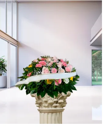 Cuscino funebre di rose e gerbere nei toni rosa pastello