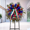 Corona funebre rose rosse e blu a Torino
