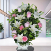 Mazzo di gigli bianchi e rose rosa a Torino