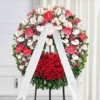 Corona funebre di fiori bianchi e rossi
