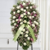 Cuscino funebre di rose bianche e dendrobium viola